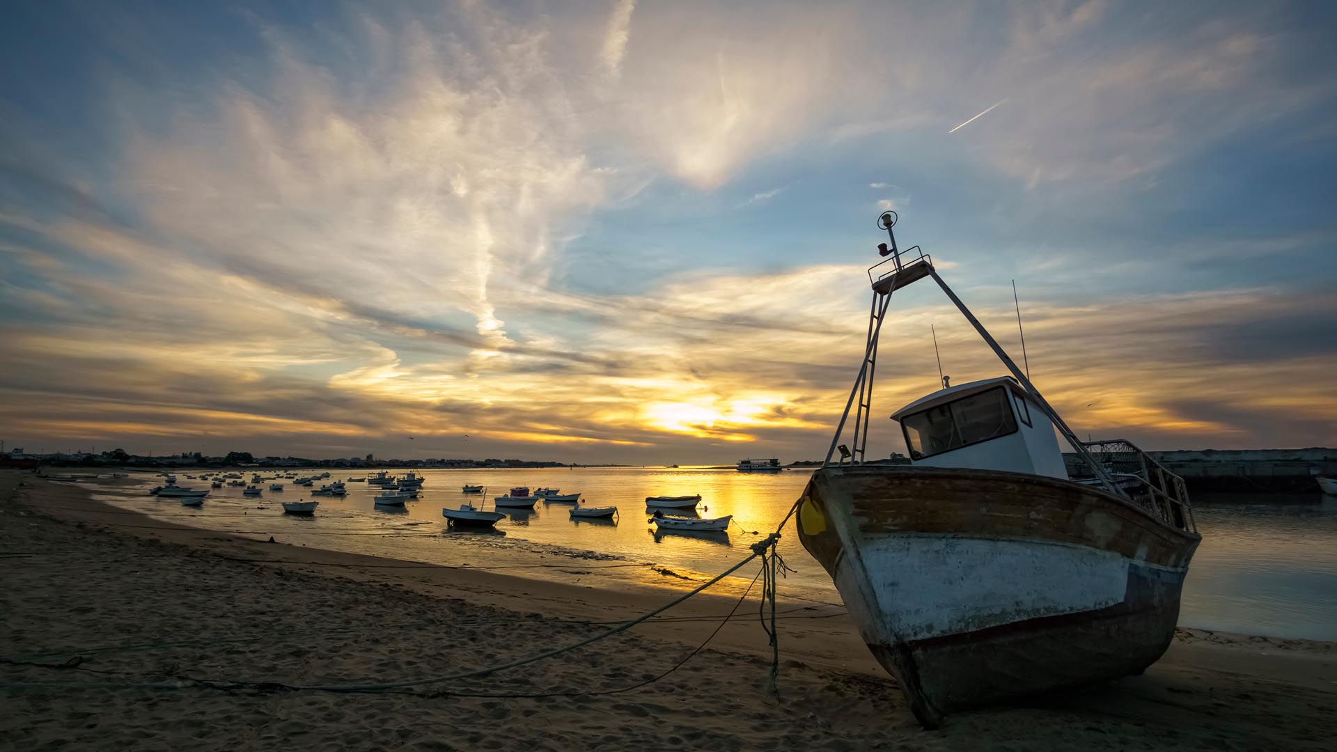 Boats On Guadalquivir River At Sanlucar De Barrameda Cadiz Spain